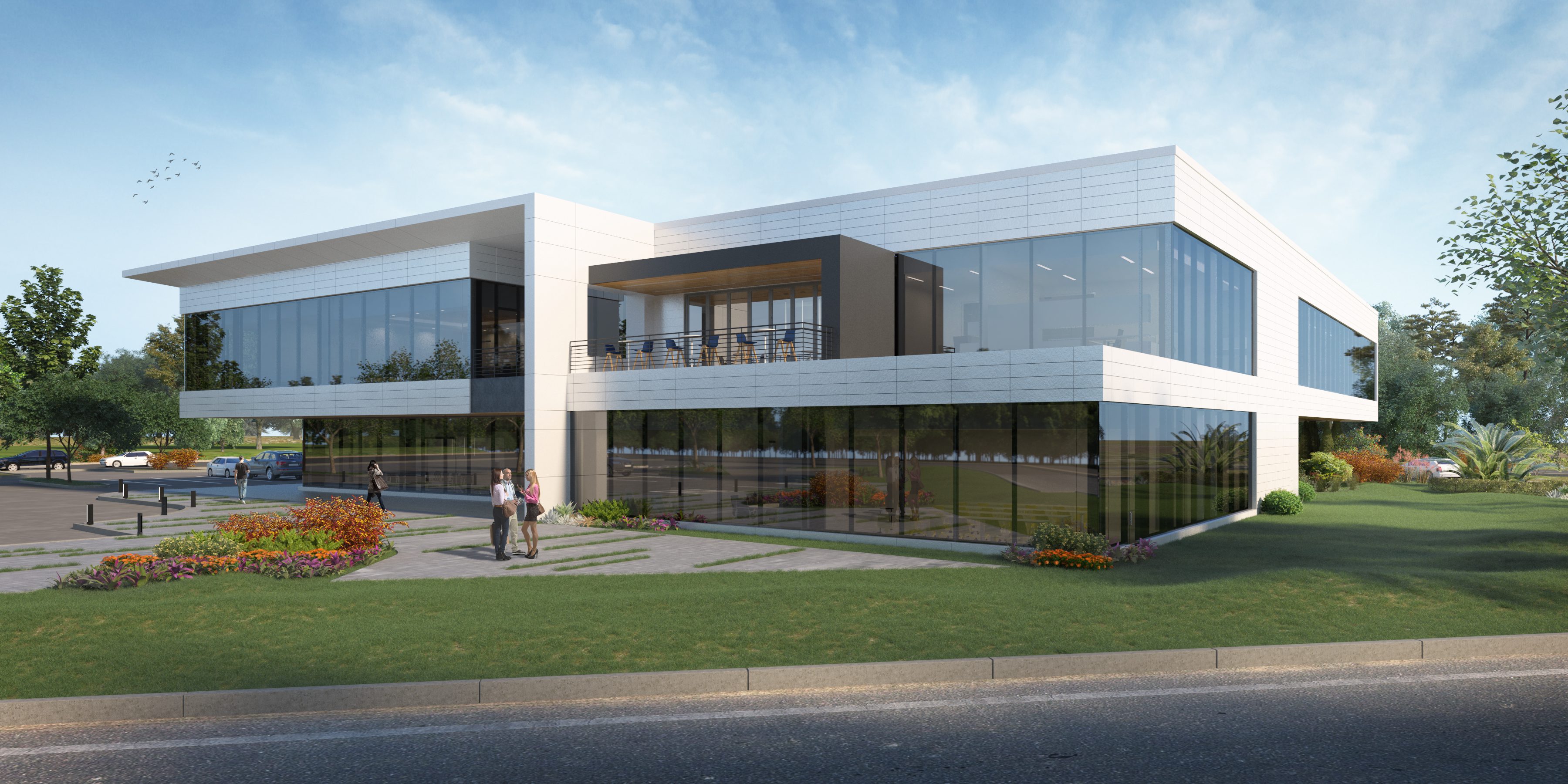 Modern two-story office building with large glass windows and clean architectural lines.