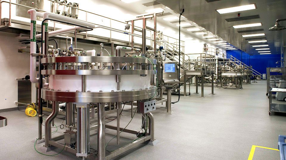 Modern automated beverage bottling line in a factory.